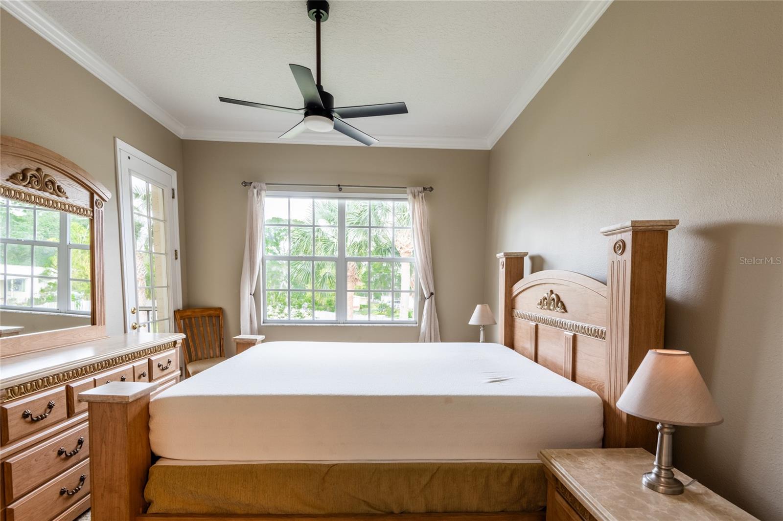 MASTER BEDROOM HAS A PRIVATE DOOR TO THE SCREEN BALCONY/PORCH