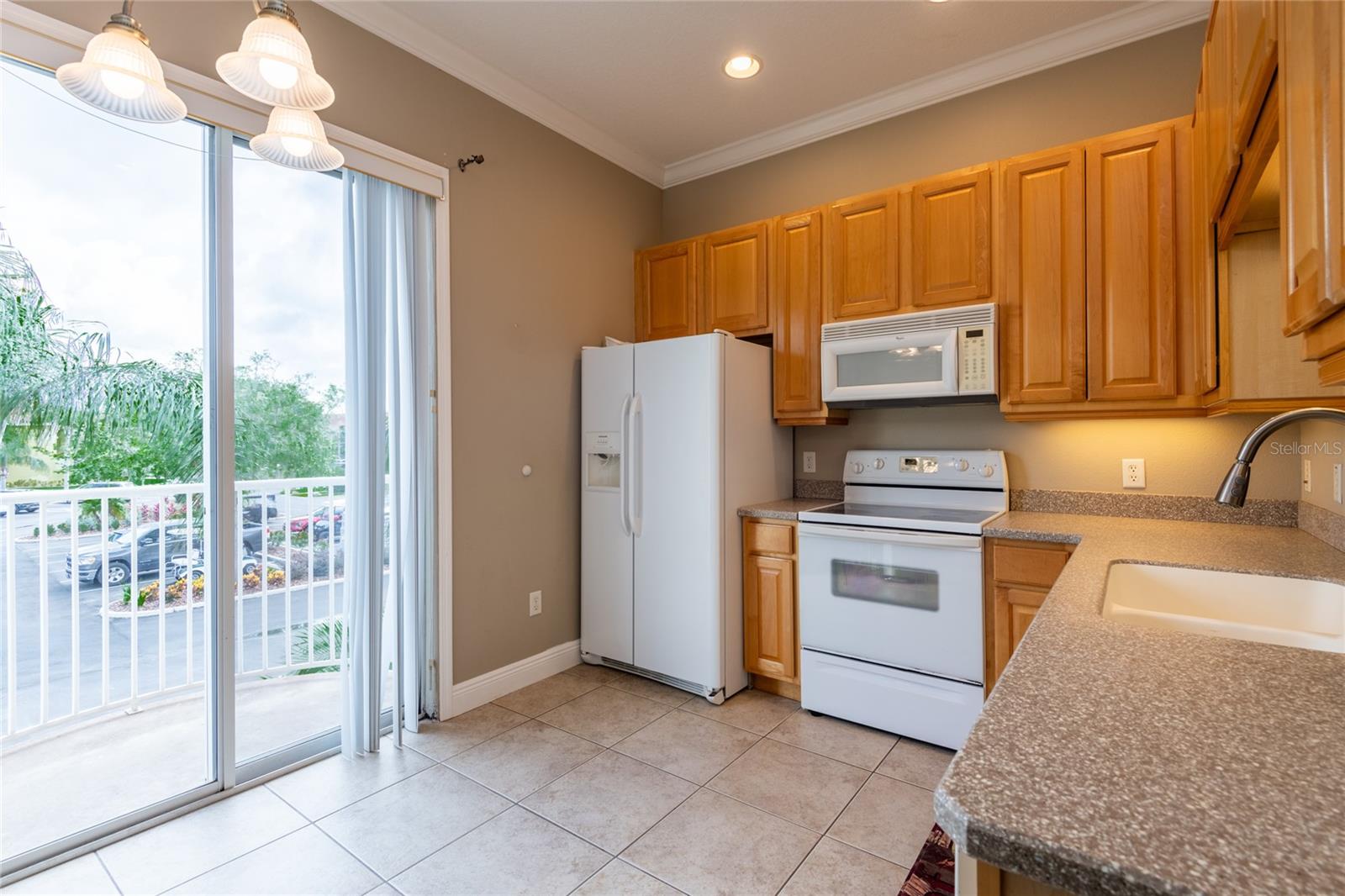 SLIDING DOORS LEADS TO OPEN BALCONY - GREAT COUNTER TOPS