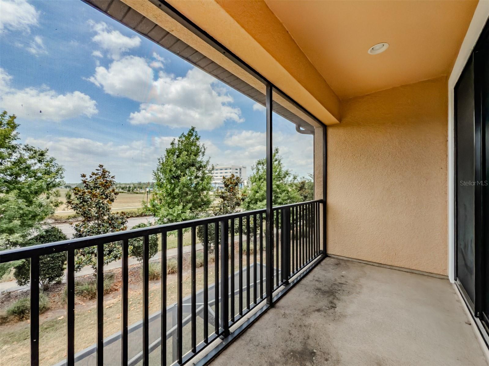 Primary Bedroom Screened Balcony