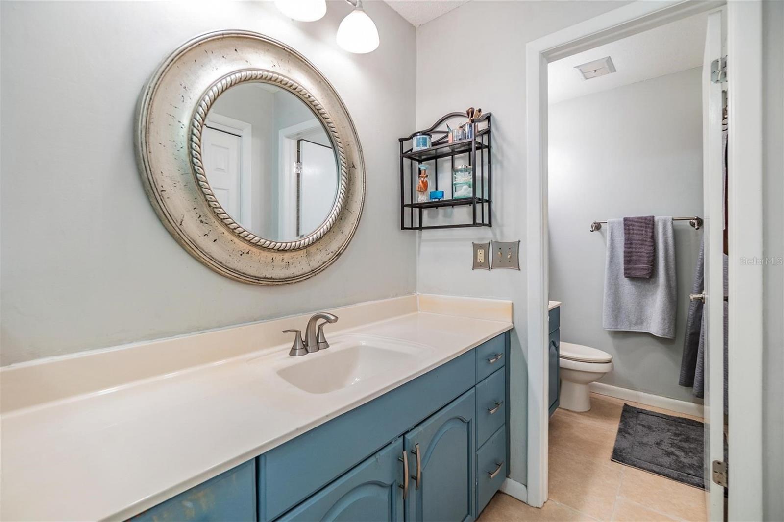 Primary bath with split vanities