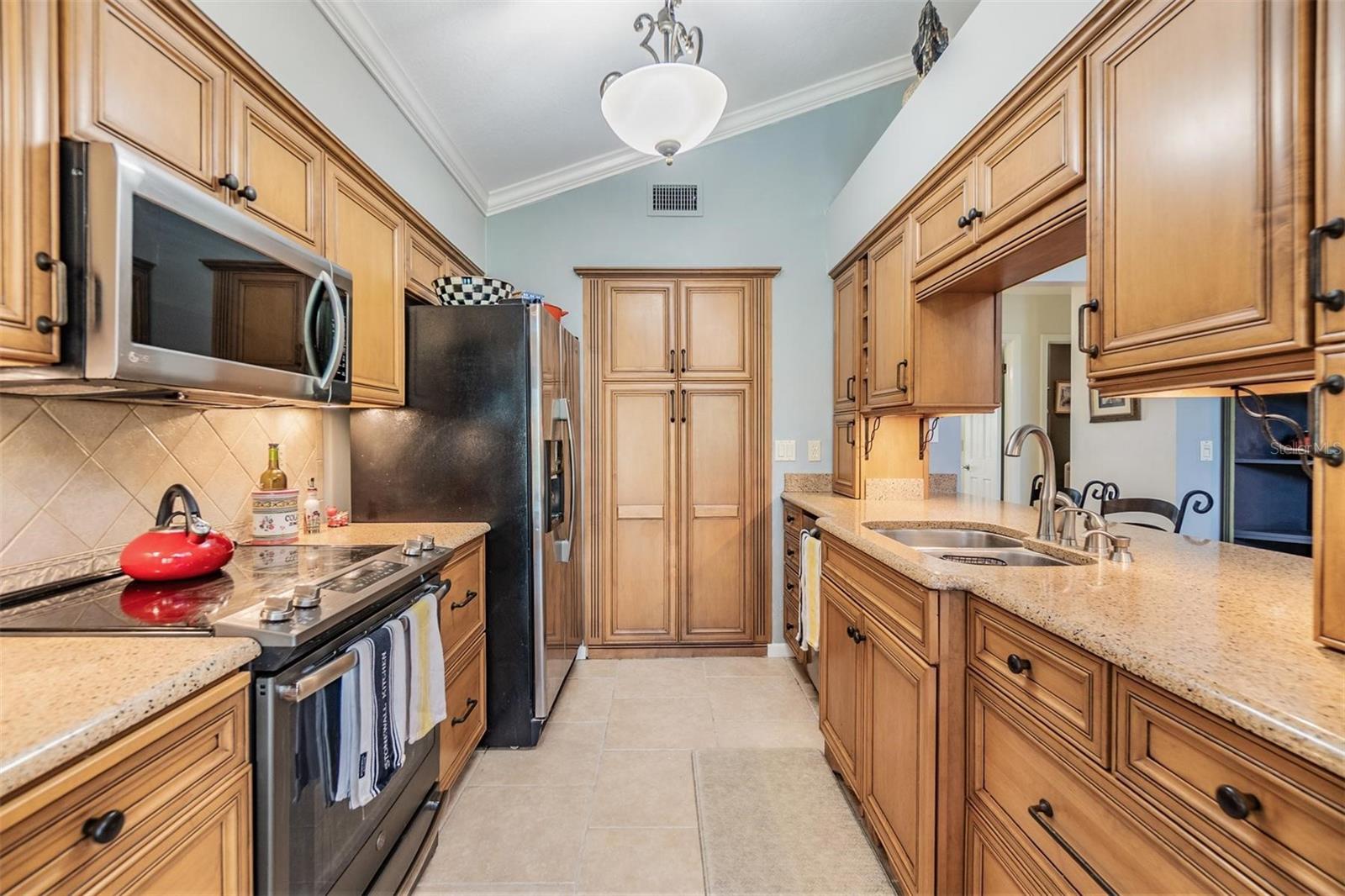 Cambria countertops and wood cabinets