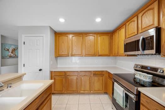 Kitchen with ALL NEW stainless steel appliances and new LED lighting