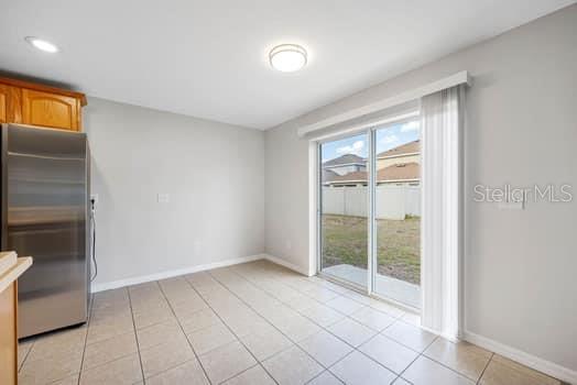 Breakfast room with new LED Lighting and new blinds on sliding glass door