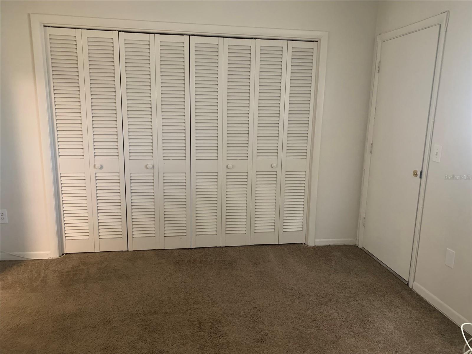 Lots of closet space the whole way across.