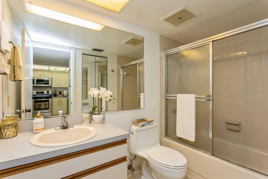 Guest Bathroom with Full Tub and Linen Closet