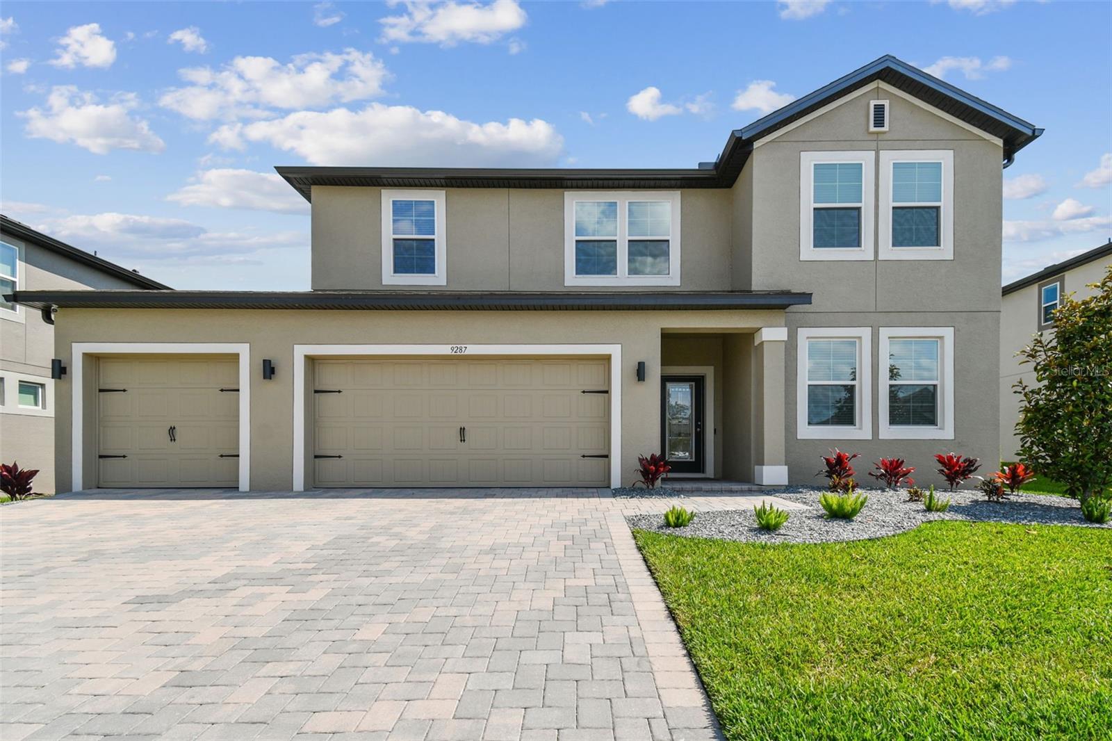 Water views & Clean, classic lines on this elevation of the MI Homes Salinas Floorplan make for stunning curb appeal- and easy maintenance