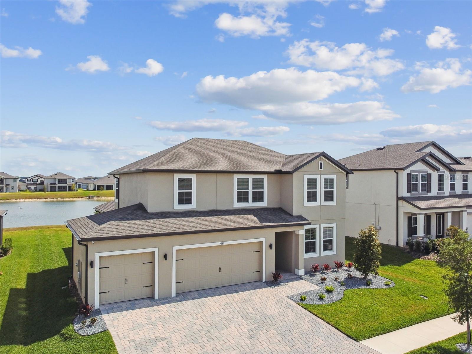 THREE car garage without the nuisance of a tandem garage. Covered porch- great for shading your Amazon deliveries, plus video doorbell in place!