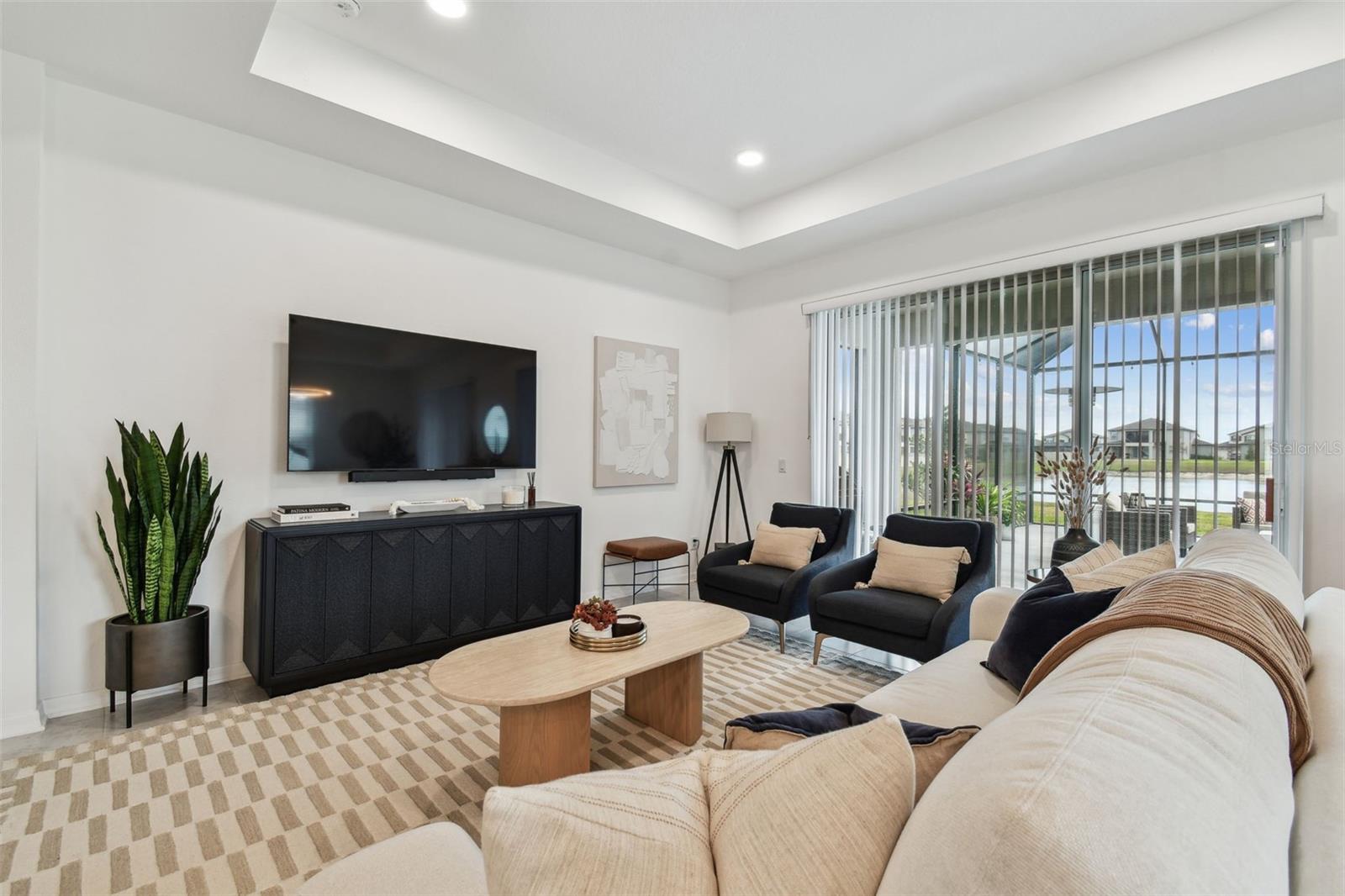 Tray ceilings with recessed lights leave room for adding future custom touches
