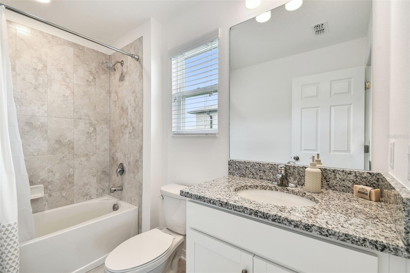 Bed 3 bathroom showing wall tile
