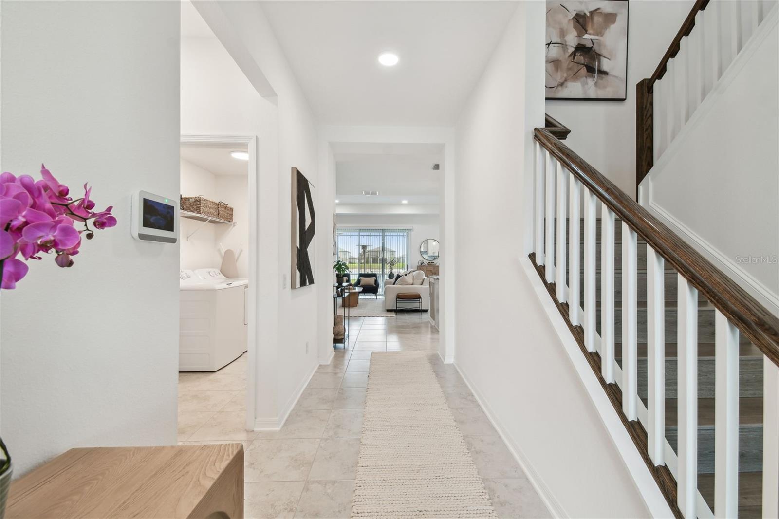 Tile on the main floor contrasts with careful use of Luxury Vinyl on the stairs and upstairs loft. Owners suite is on the first floor- three additional bedrooms and loft upstairs!