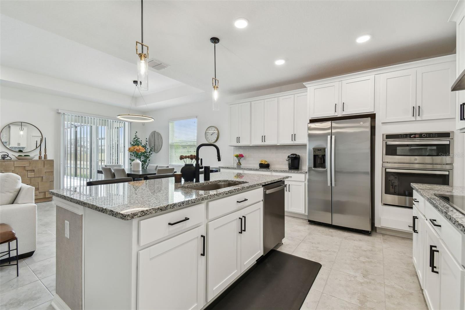 Upgraded Gourmet Kitchen with built in oven/microwave, (quiet) dishwasher, hood and cooktop