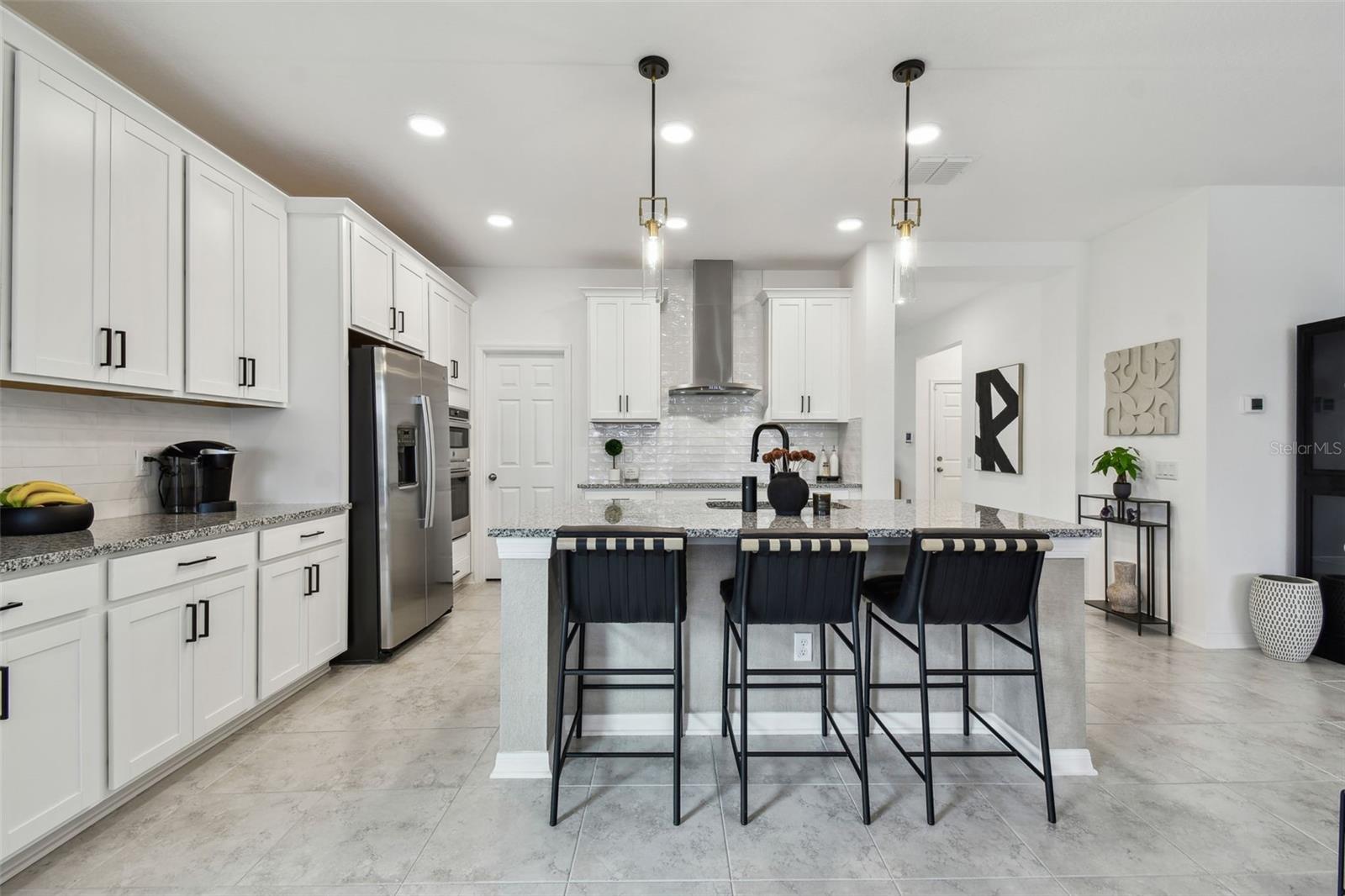 Plenty of cabinet space, and to the rear of the kitchen is the HUGE walk in pantry!