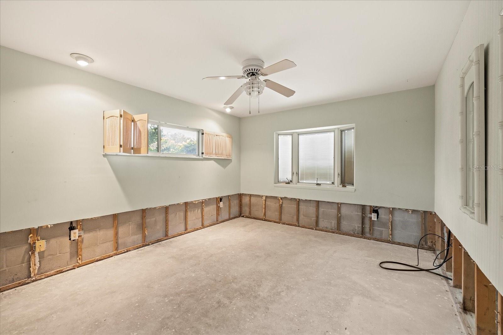 Guest bedroom near kitchen