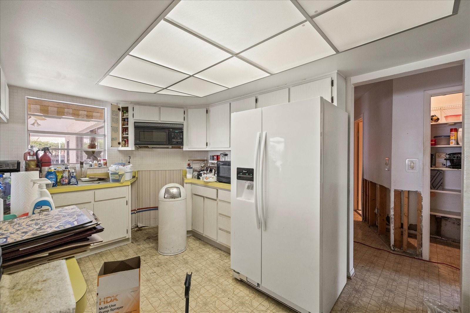 Kitchen with dishwasher and range hookups
