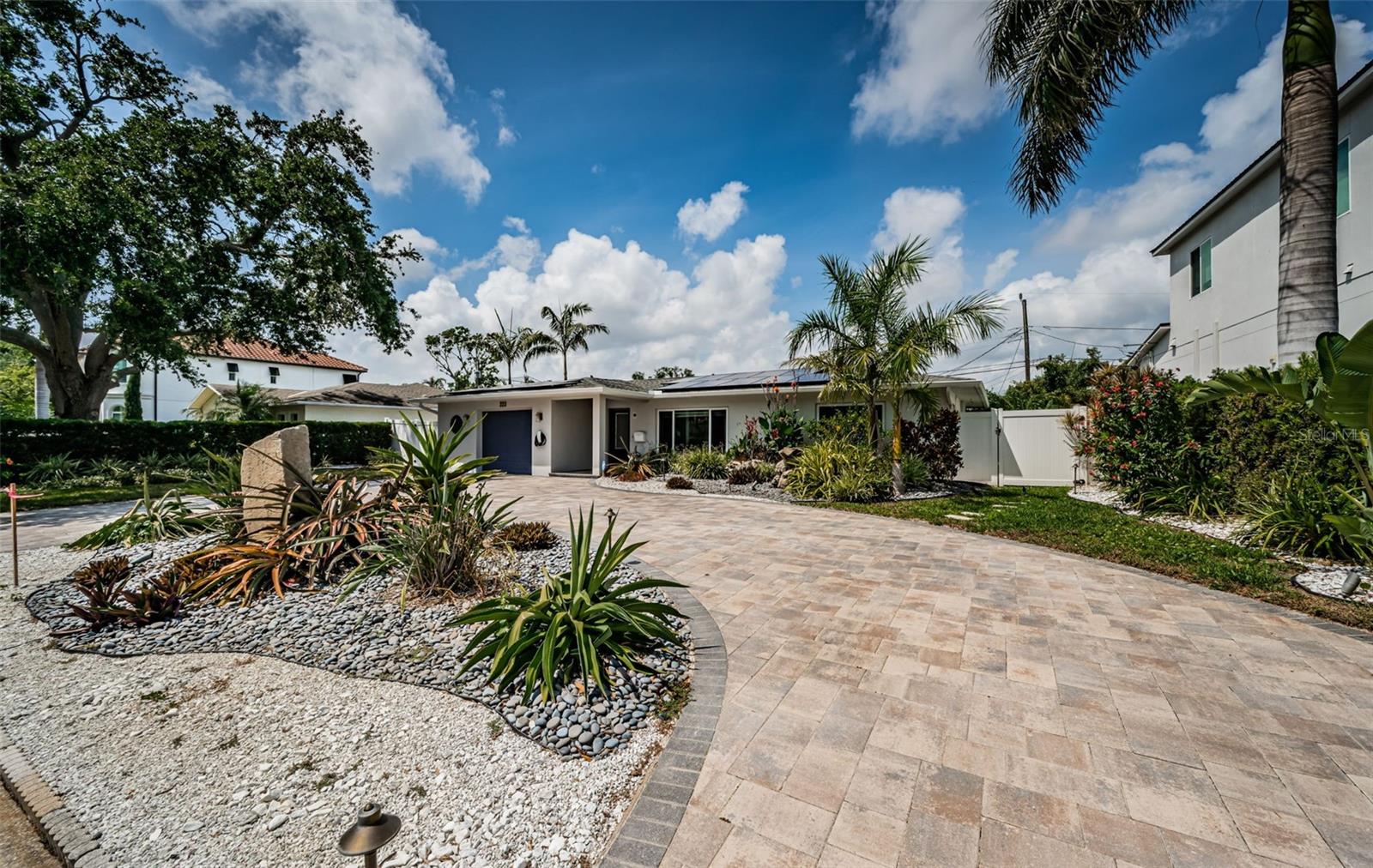 Located on the picturesque street of Belleair in the desirable Snell Isle Neighborhood.