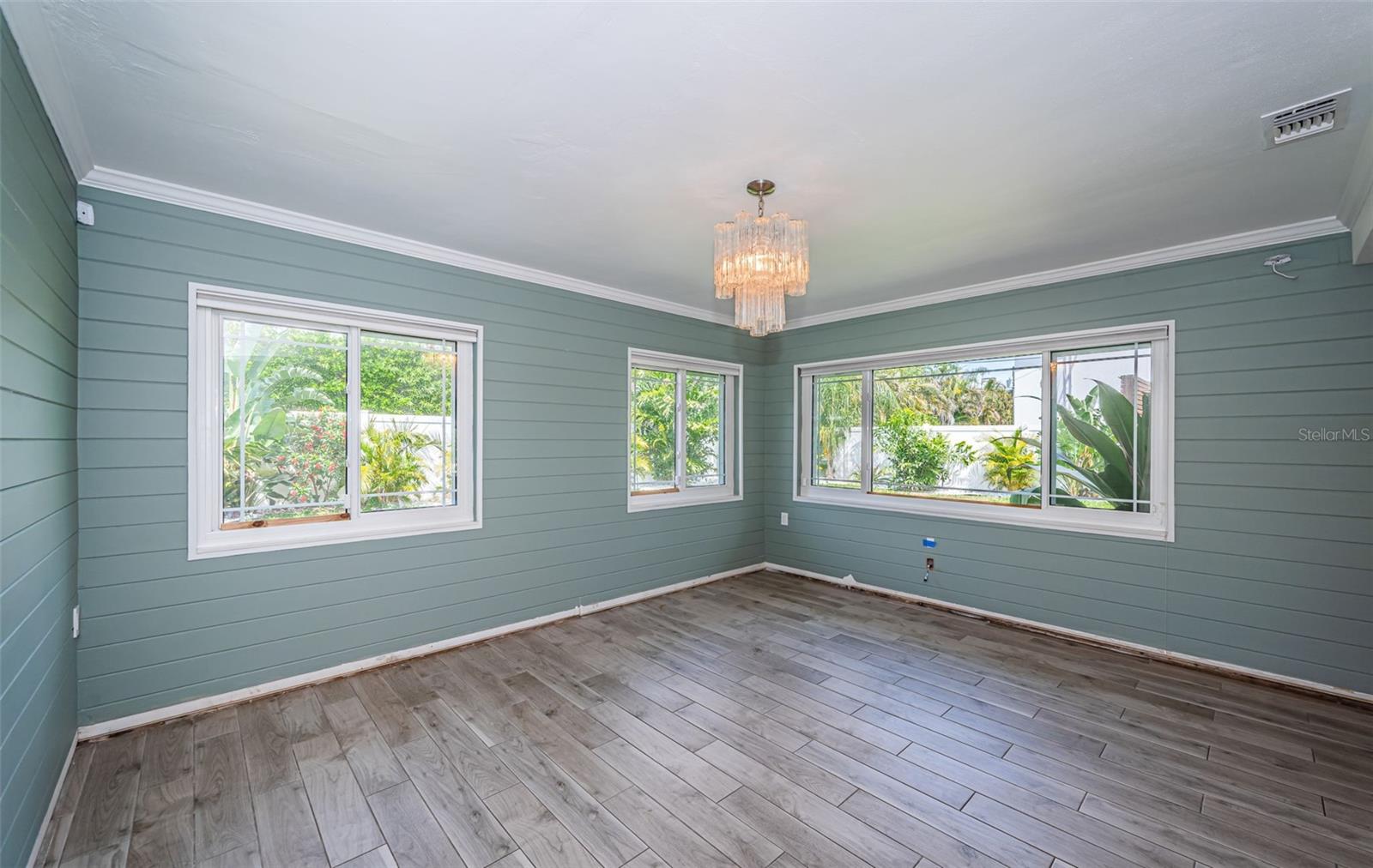 Family Room overlooks beautiful backyard.