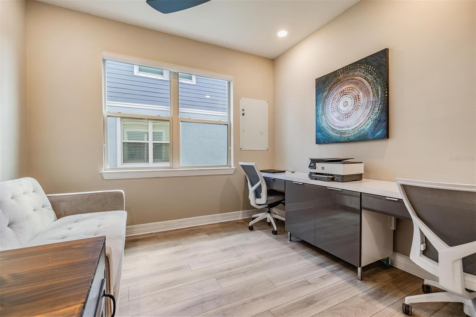 Den/office located on first floor, desk stays!
