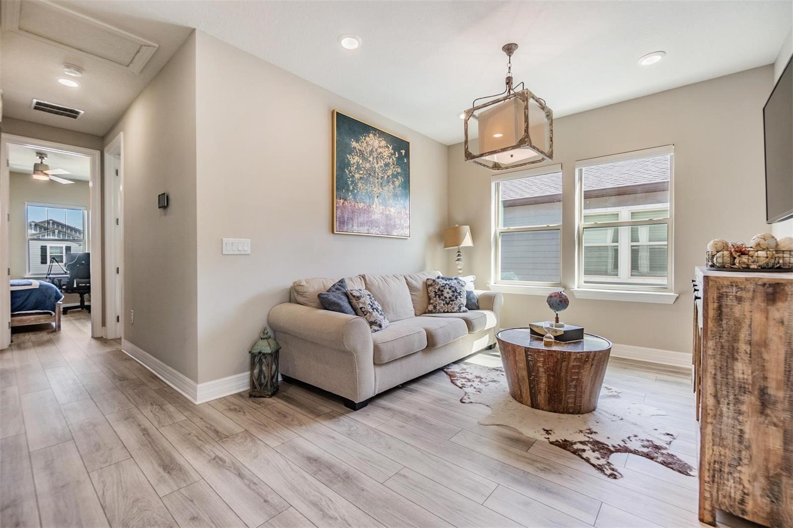 upstairs with loft and split bedroom floorplan