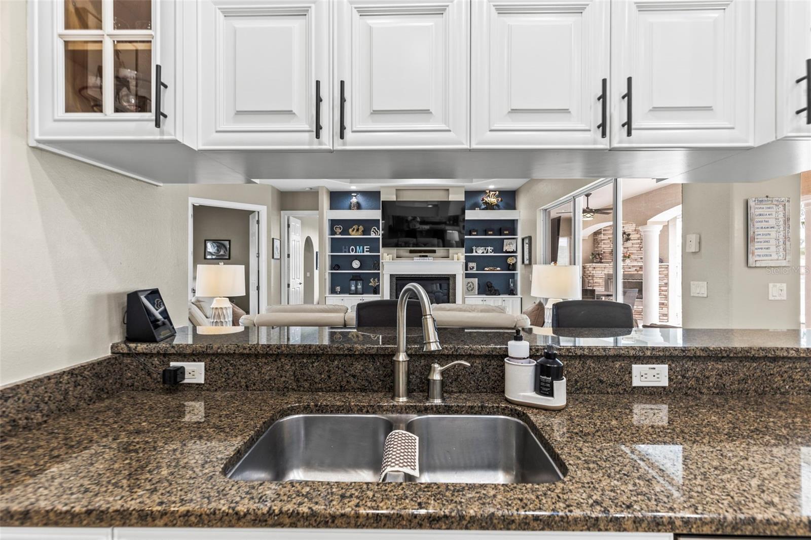 Granite countertops throughout the kitchen