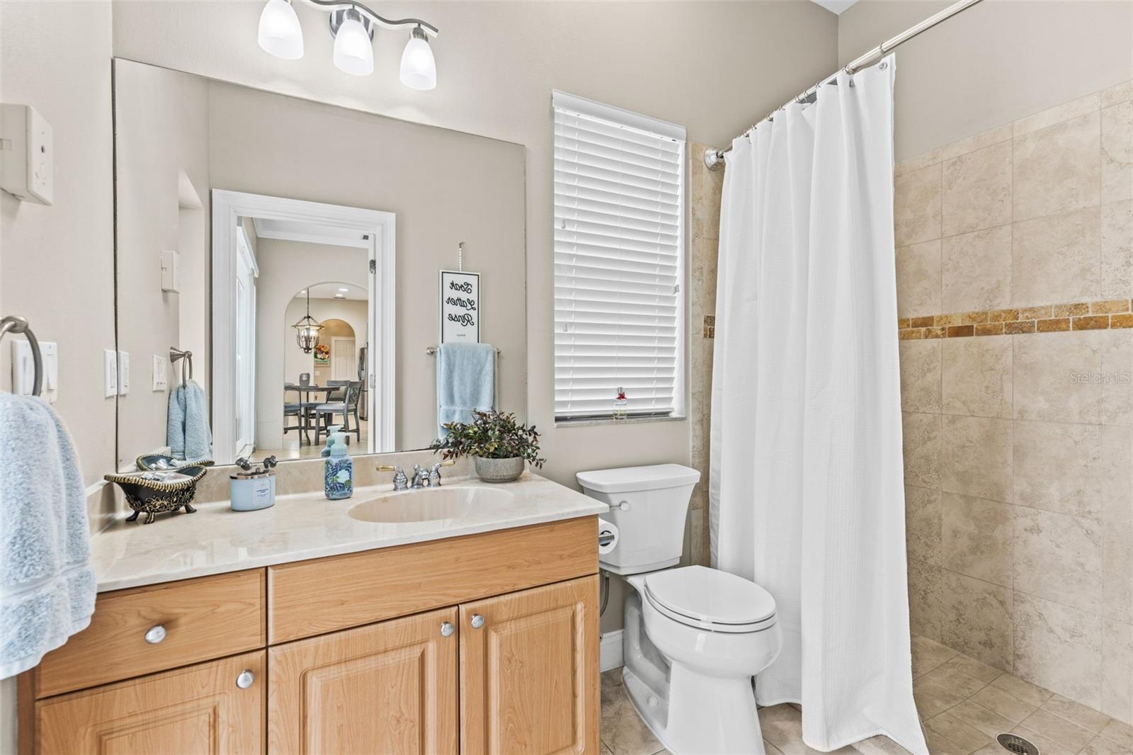 Third bathroom with direct access to the outdoor pool area