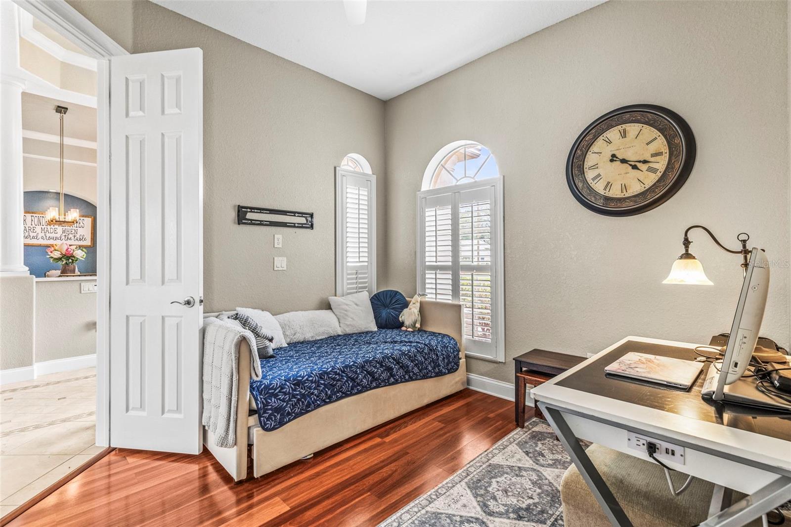 Office with direct access to both the main entryway and the primary bedroom
