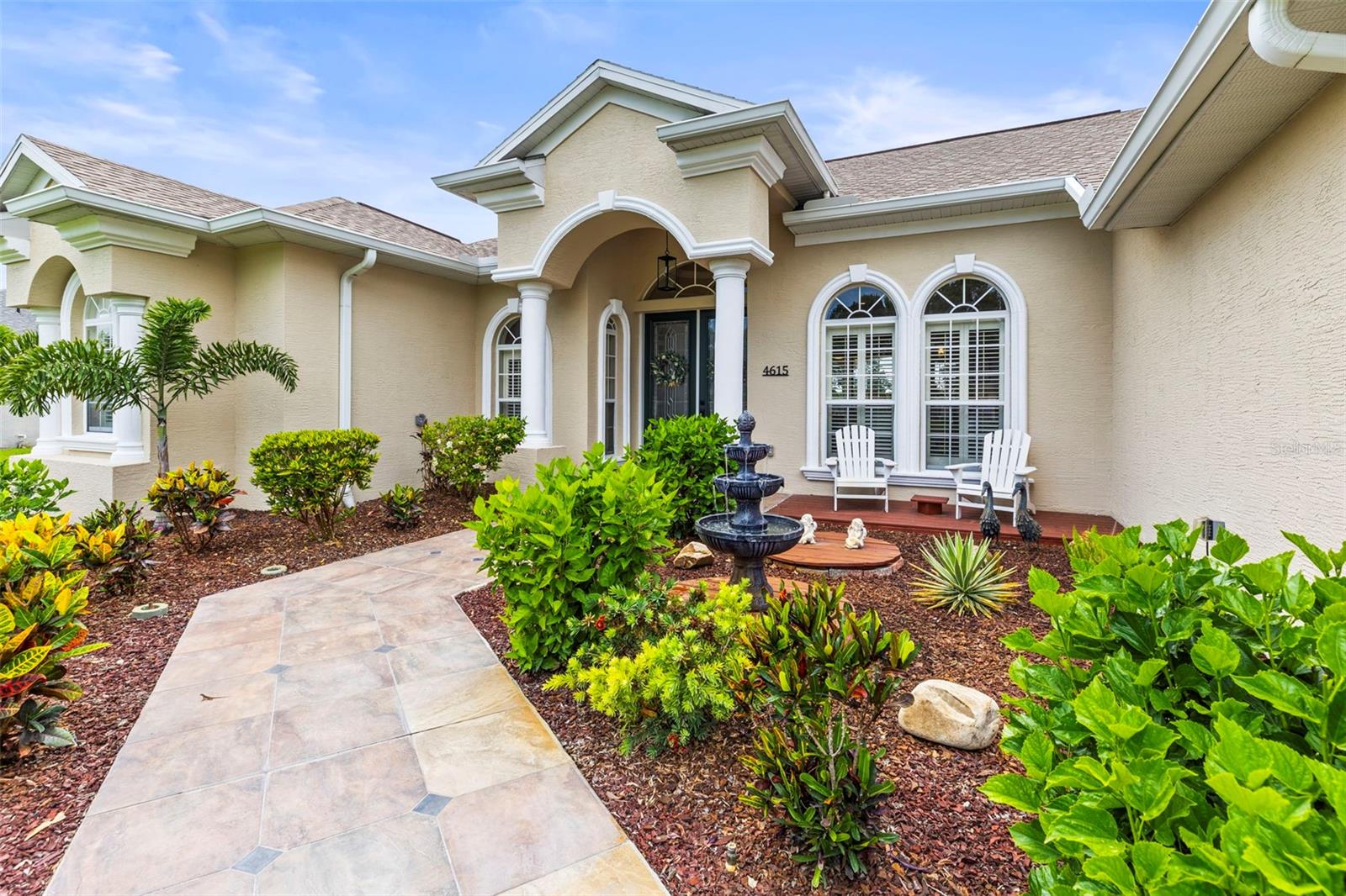 Tastefully landscaped walkway to the main entrance
