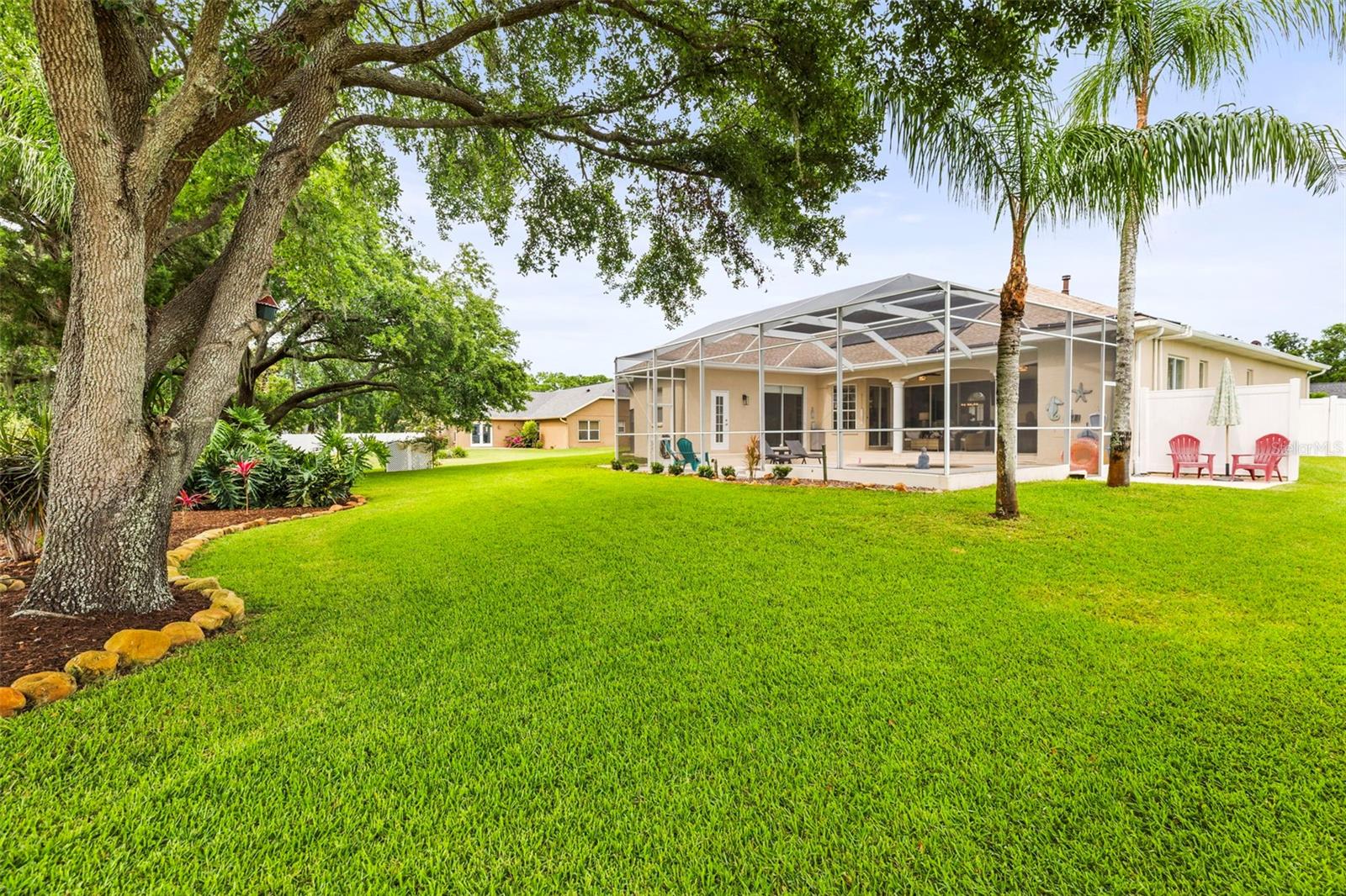 Back corner of yard overlooking the pool