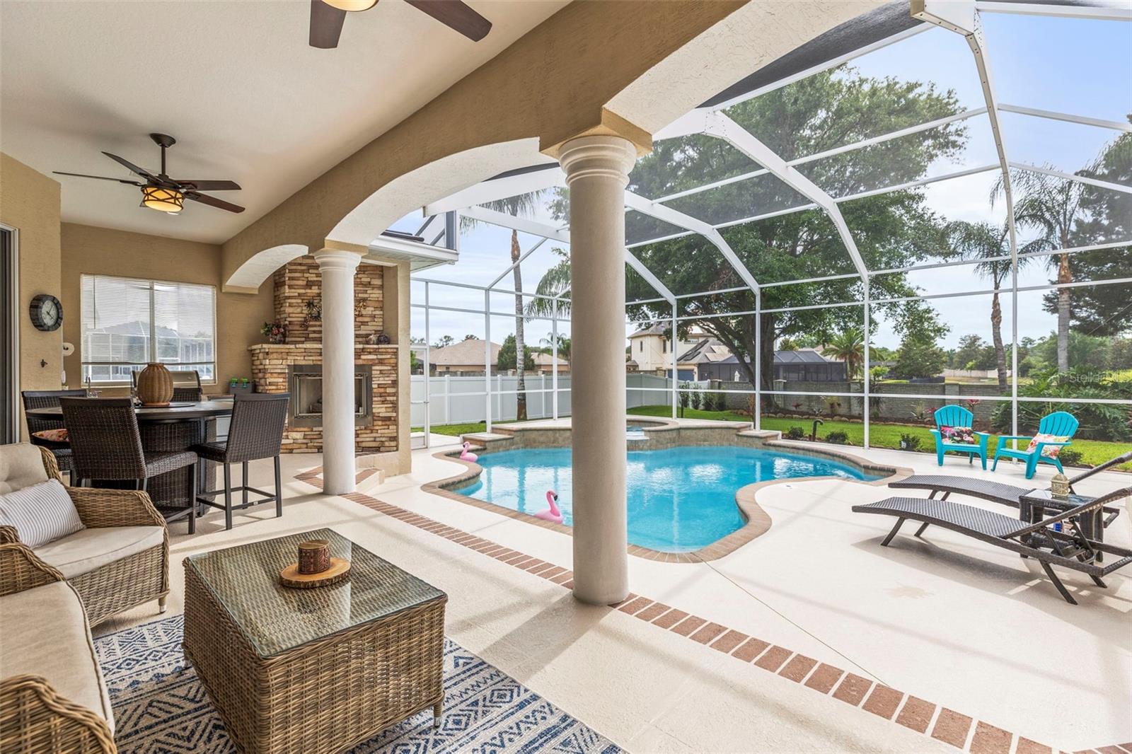 Luxury amenities continue to the backyard oasis