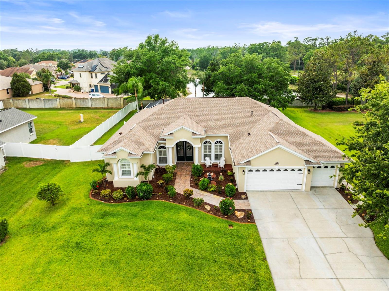 Home backs up to a retention pond which provides better privacy in the rear of the house