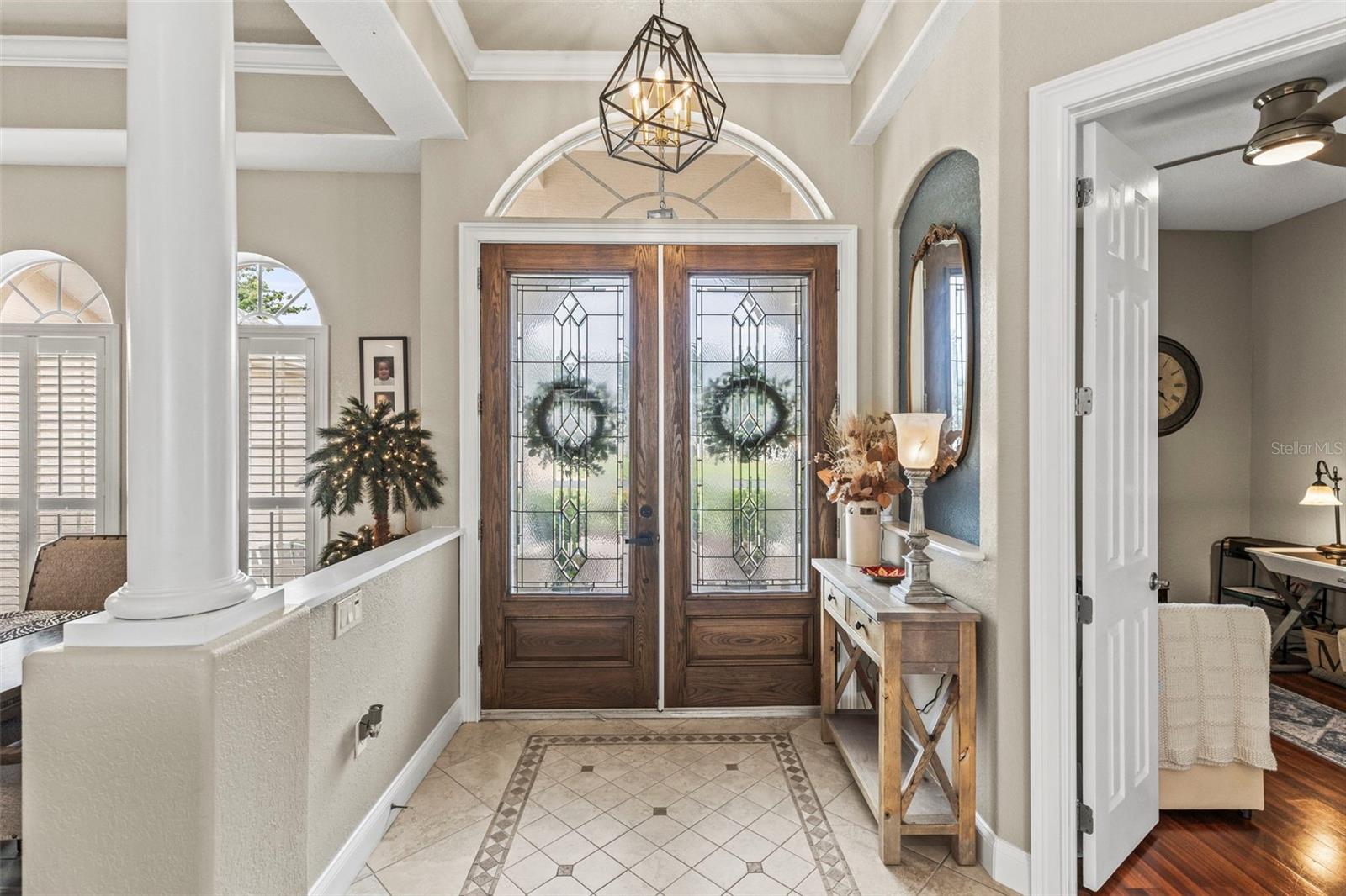 Front entry with tile design in the floor