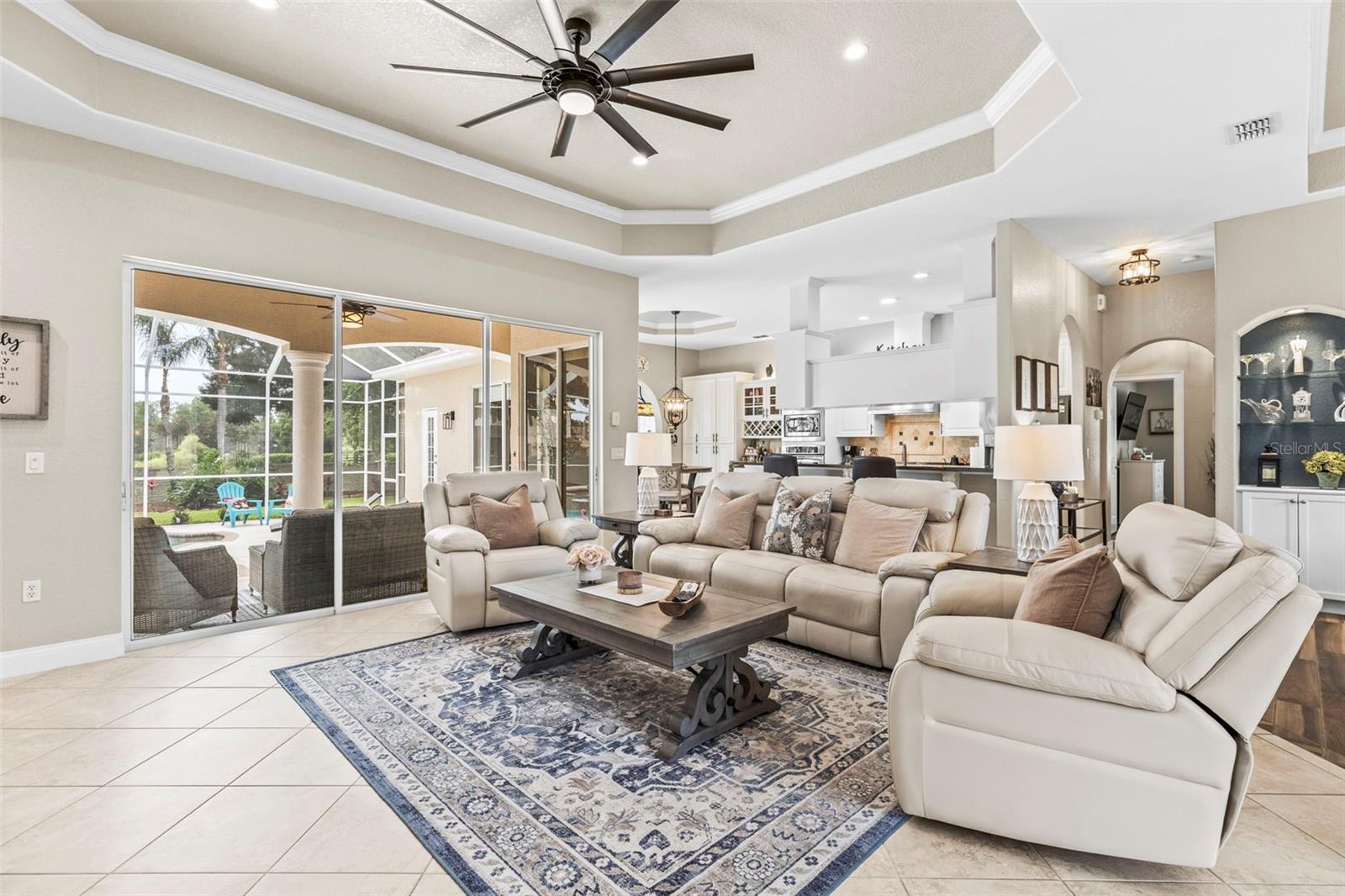 Spacious, open floorpan with family room leading out to the rear patio and pool