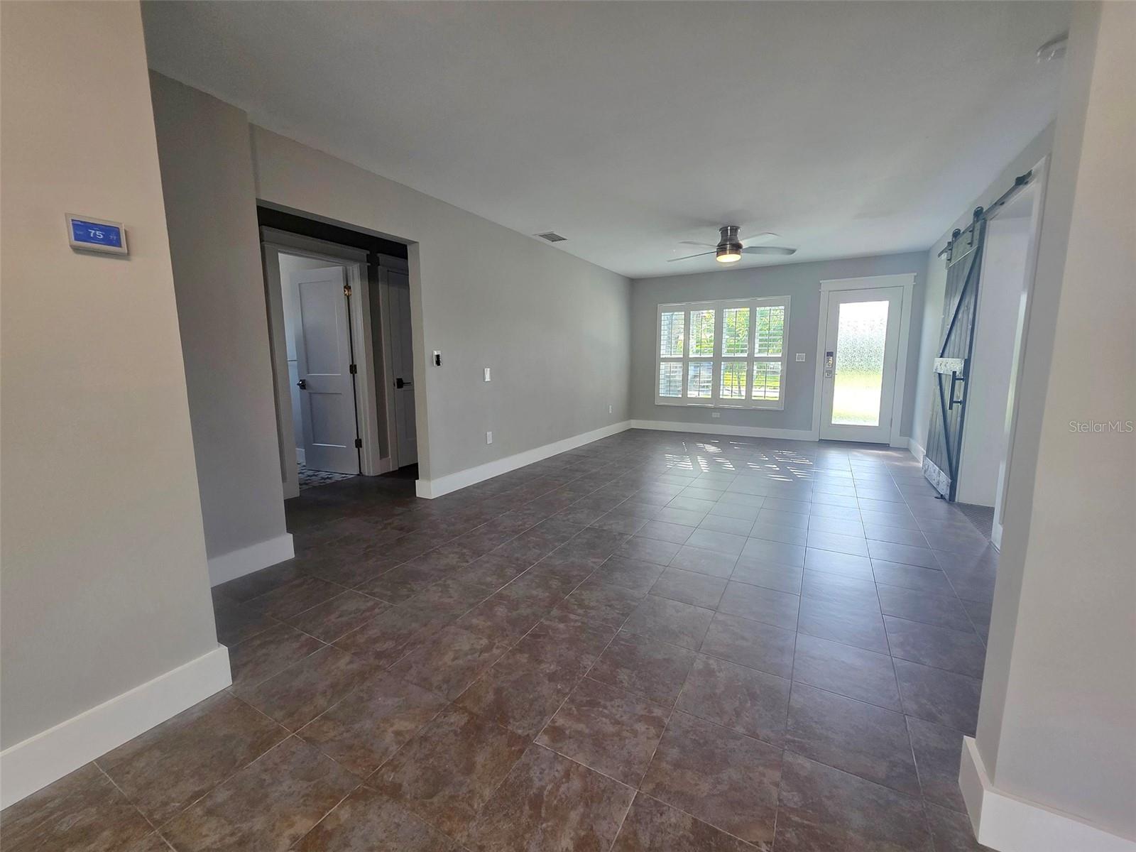 View of living / dining room combo from kitchen.