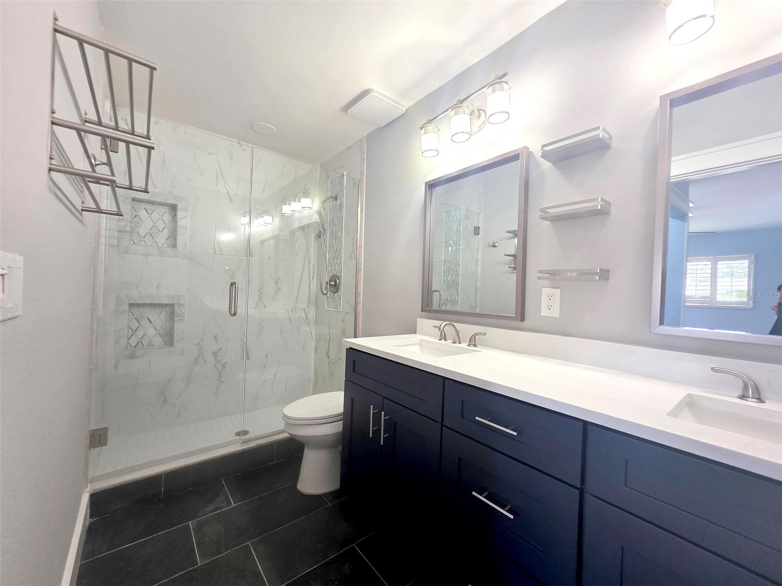 Primary bedroom en-suite bathroom.