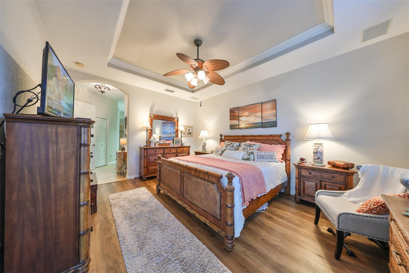 This very large space provides for all of your furniture needs.  Notice the beautiful luxury vinyl plank flooring.