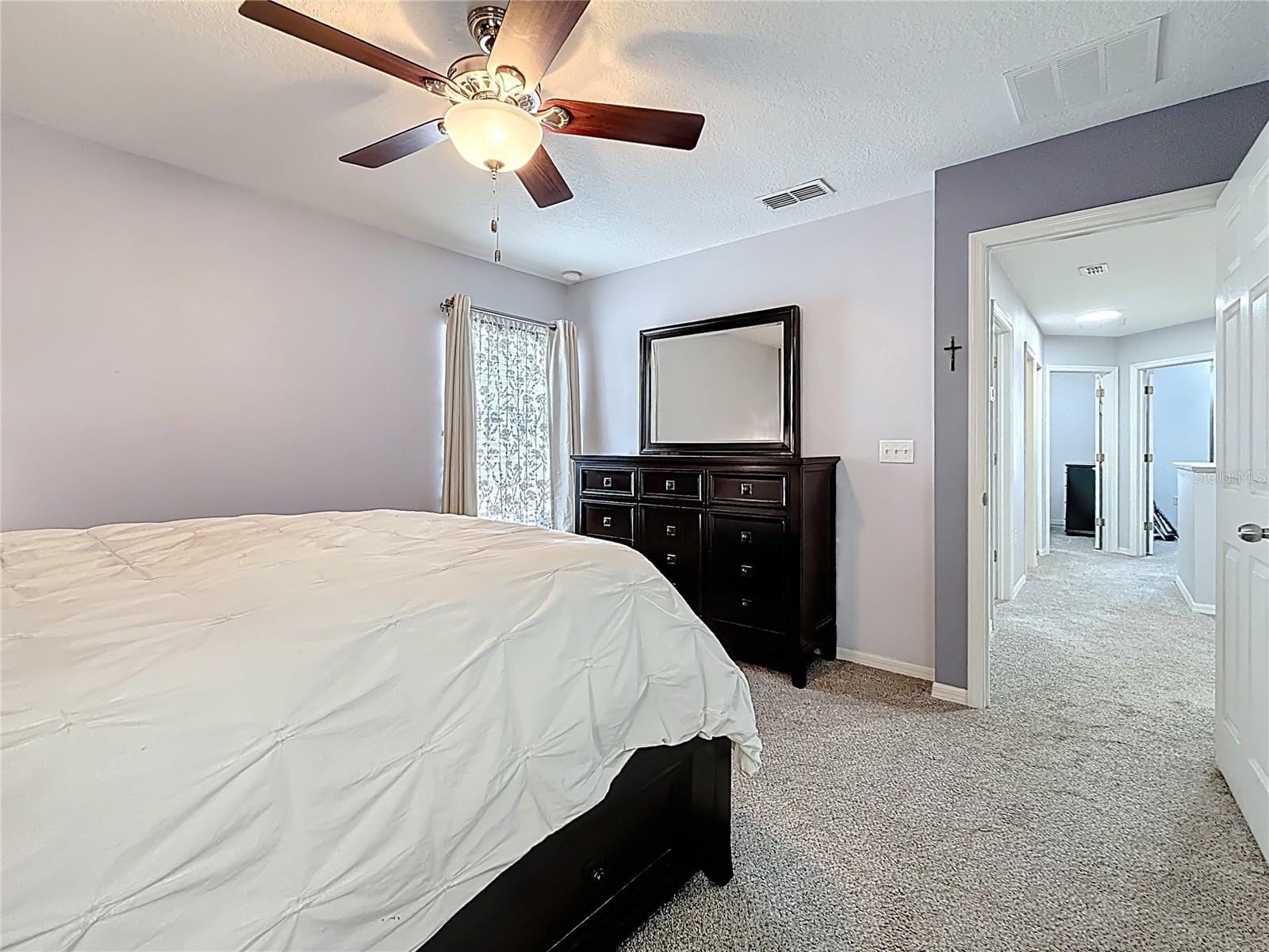 Primary Suite with Walk-In Closet and En-Suite Bath