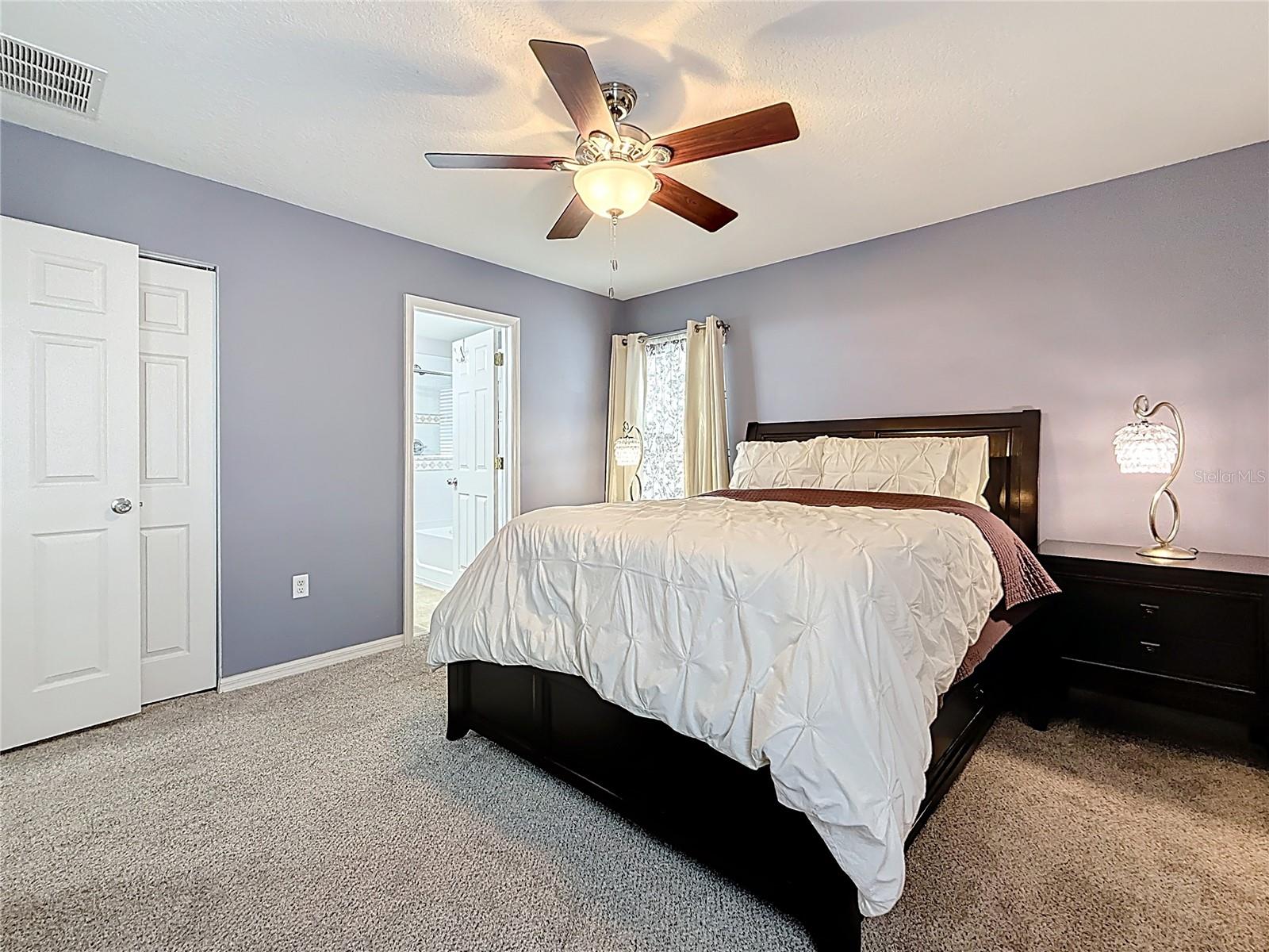 Primary Suite with Walk-In Closet and En-Suite Bath