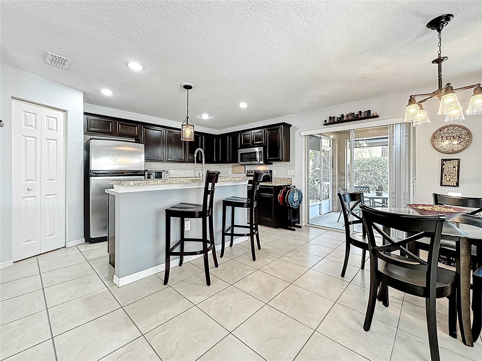Kitchen - Dining Room - Sliding Doors to Screened Patio