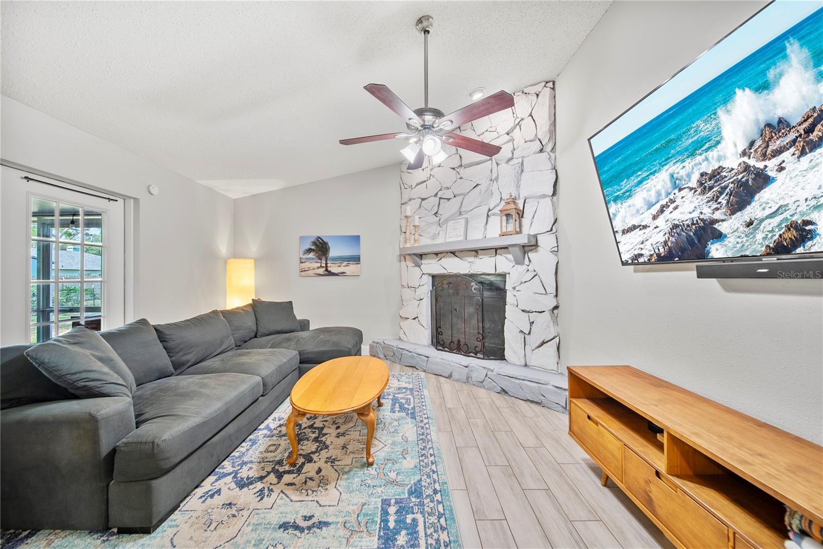 Family Room with wood-burning fireplace