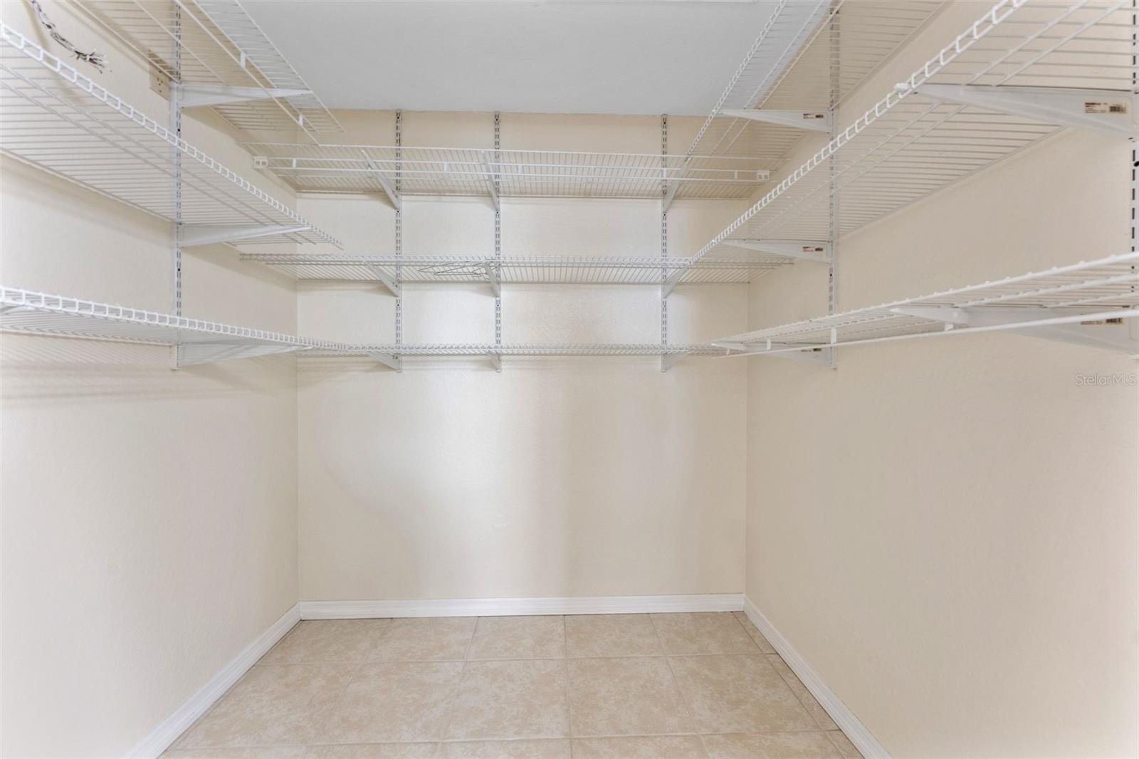 Primary Bedroom walk in closet