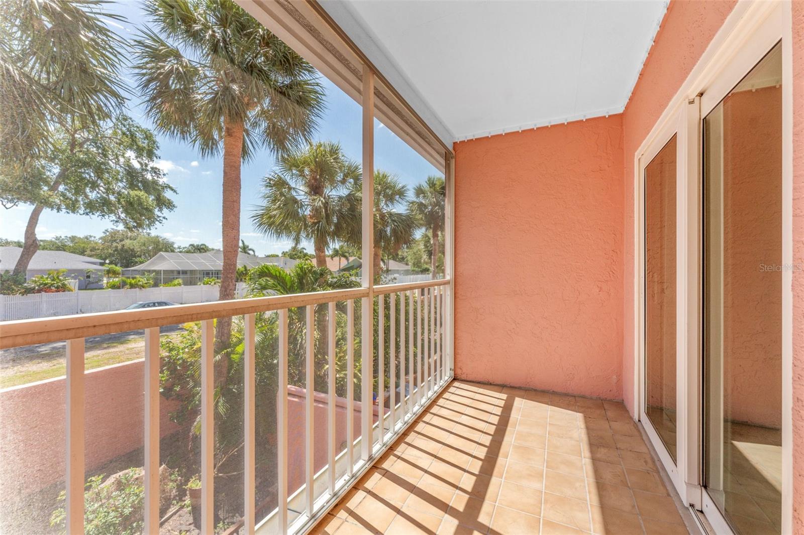 Screened Balcony from Primary Bedroom