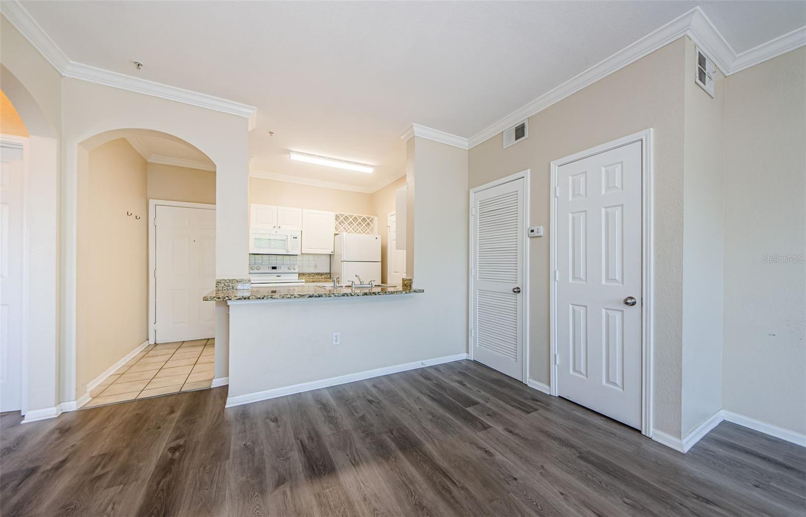 Open Concept with granite countertops & open bar
