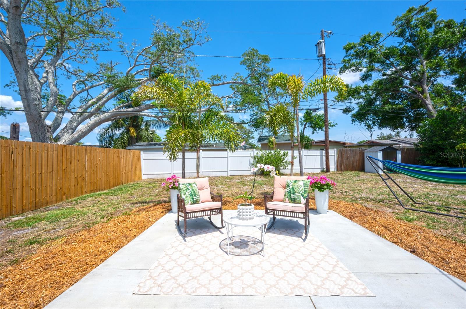 Backyard entertaining area with new concrete patio