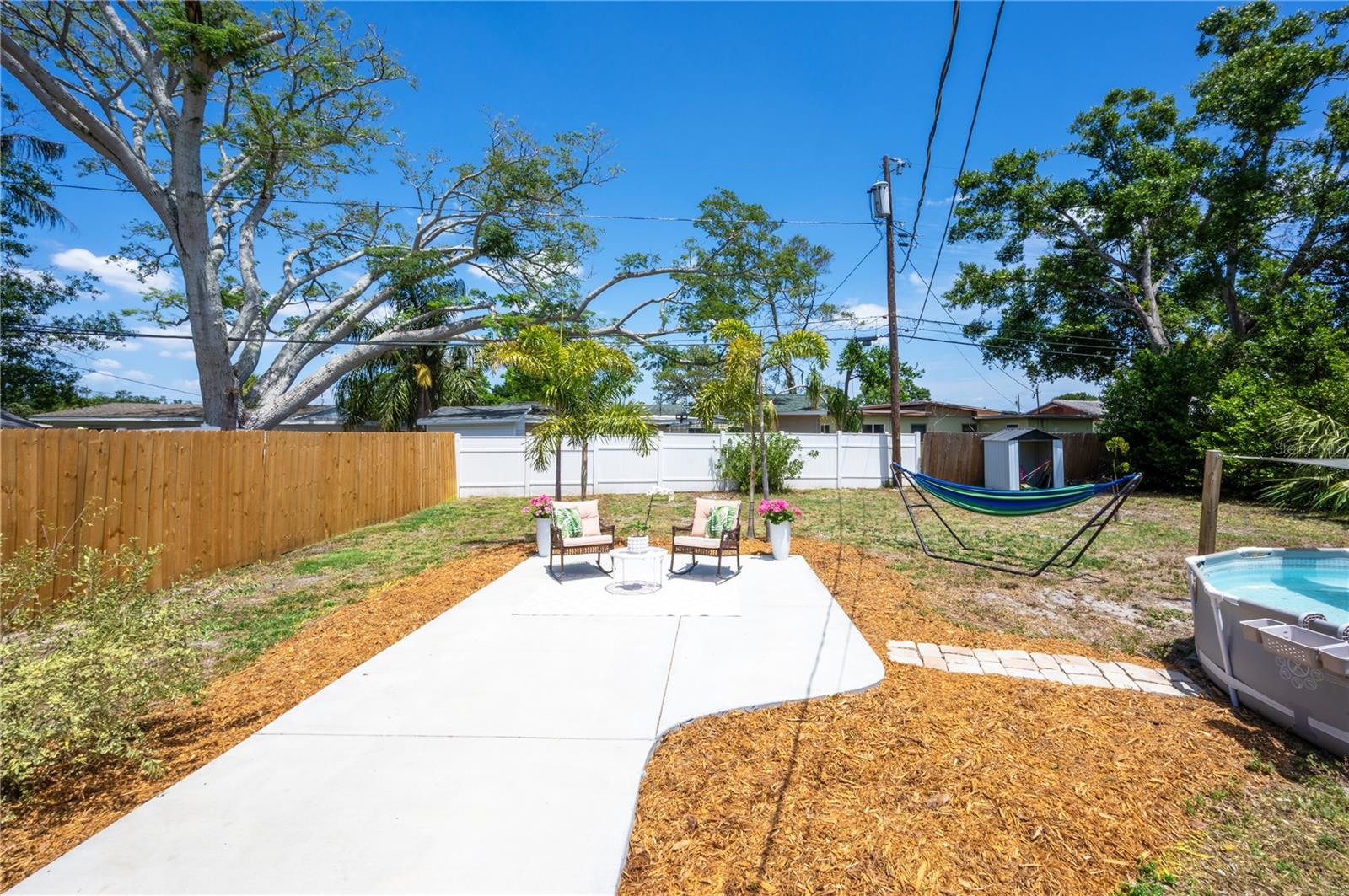 Backyard entertaining area with new concrete patio