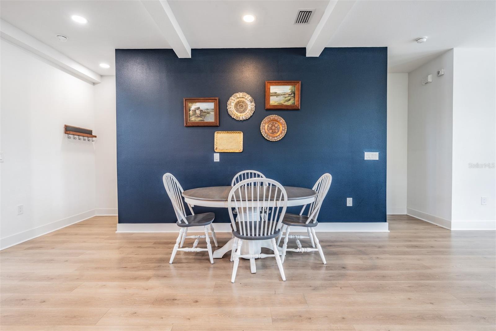 Open Concept with Kitchen, Dining and Living Room with Balcony, Laundry and Half Bath on the 2nd Floor