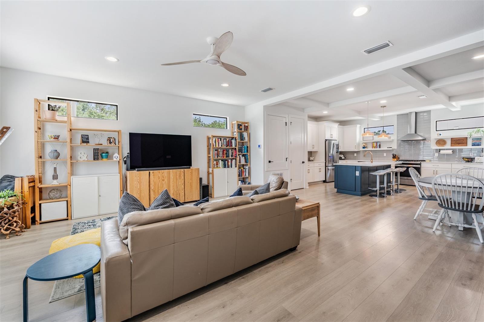 Open Concept with Kitchen, Dining and Living Room with Balcony, Laundry and Half Bath on the 2nd Floor