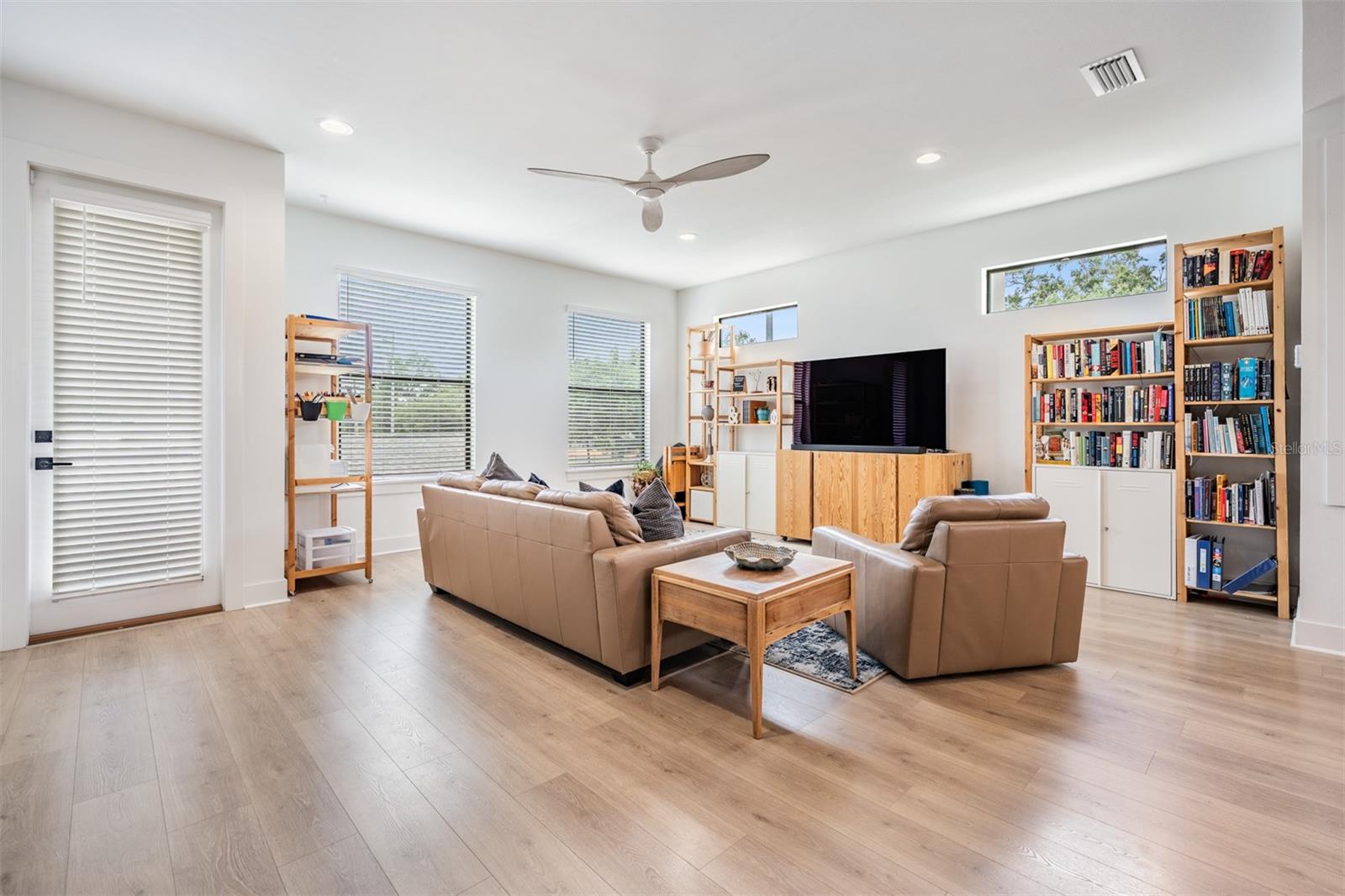 Open Concept with Kitchen, Dining and Living Room with Balcony, Laundry and Half Bath on the 2nd Floor