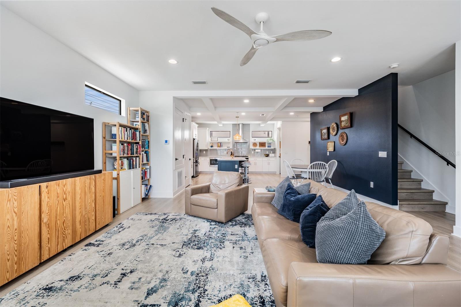 Open Concept with Kitchen, Dining and Living Room with Balcony, Laundry and Half Bath on the 2nd Floor