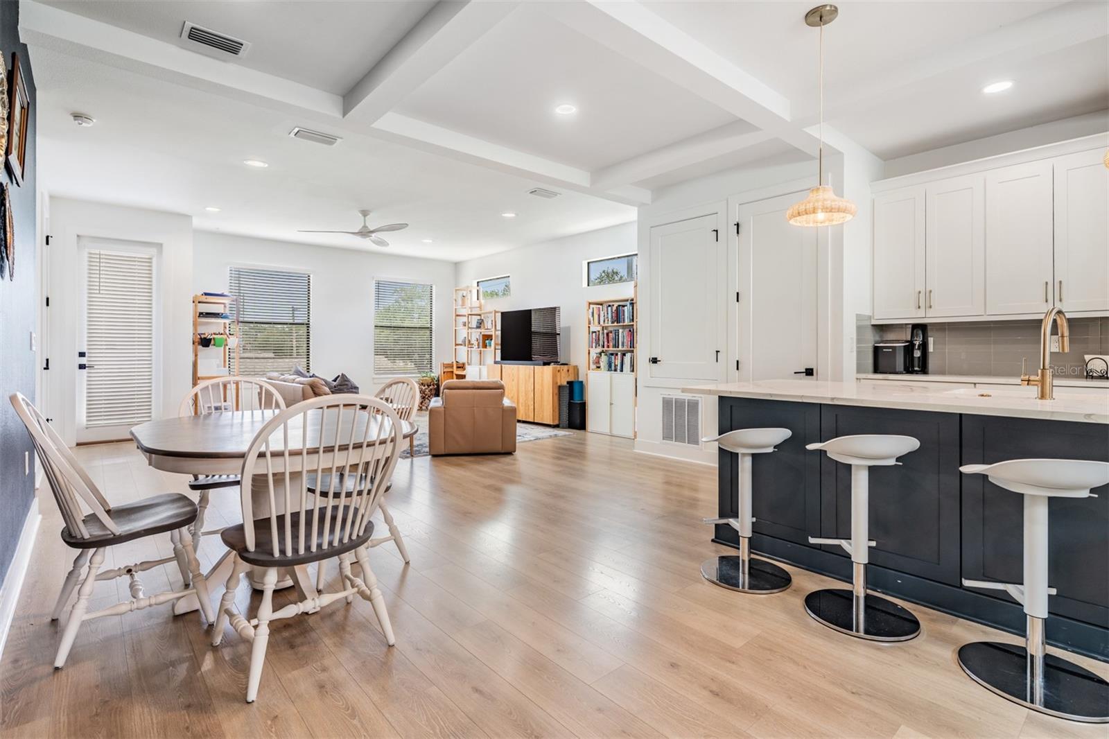 Open Concept with Kitchen, Dining and Living Room with Balcony, Laundry and Half Bath on the 2nd Floor