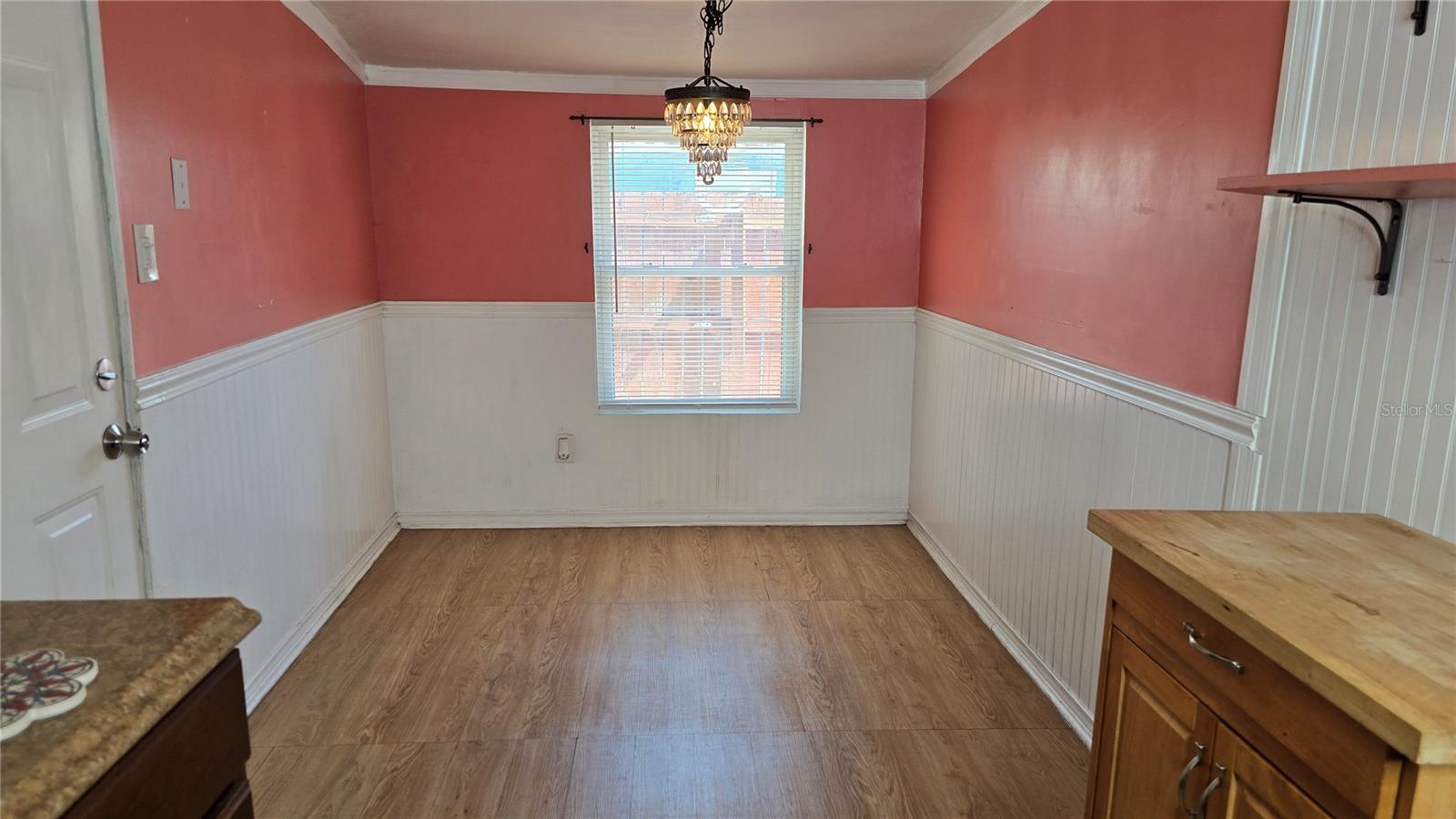 Dining Room.  Door on the left is the back door to the backyard.