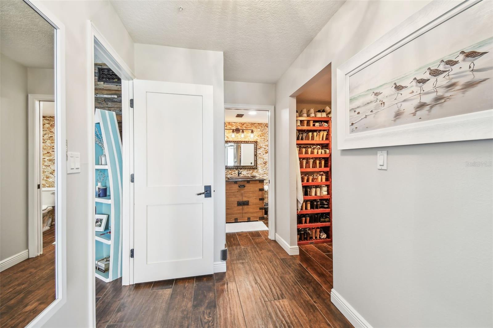 There are three closets in this bedroom